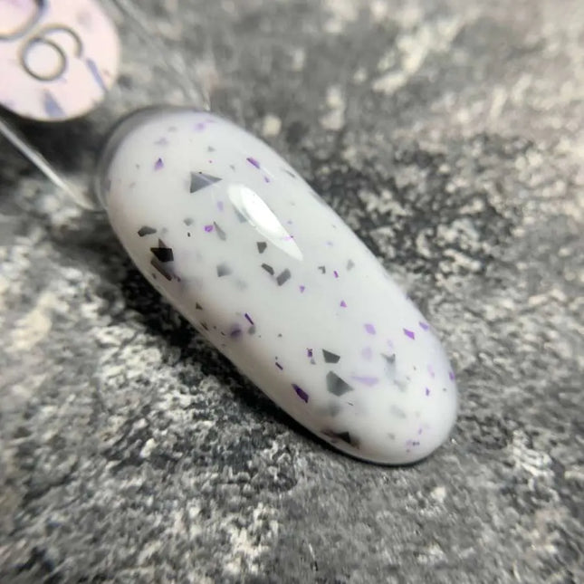 Luna Capa de base Mármol №06 Leche con papel negro y púrpura 13ml